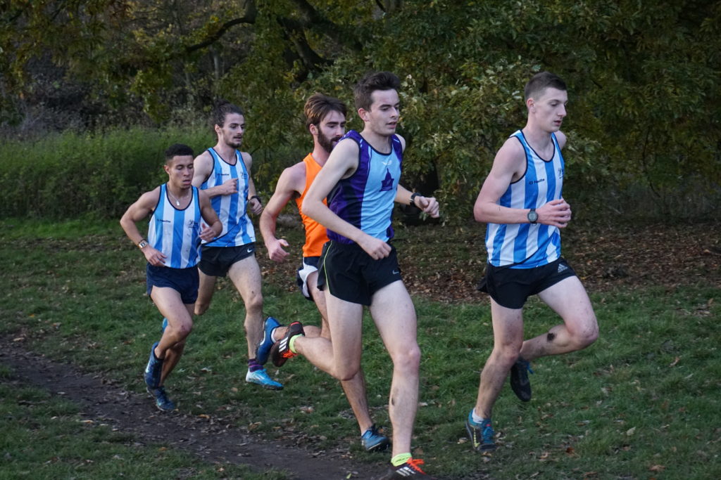 Duncan Tomlin and Charlie Haywood battle each other - and the combined forces of St Mary's - as they race for the UL XC champs title.