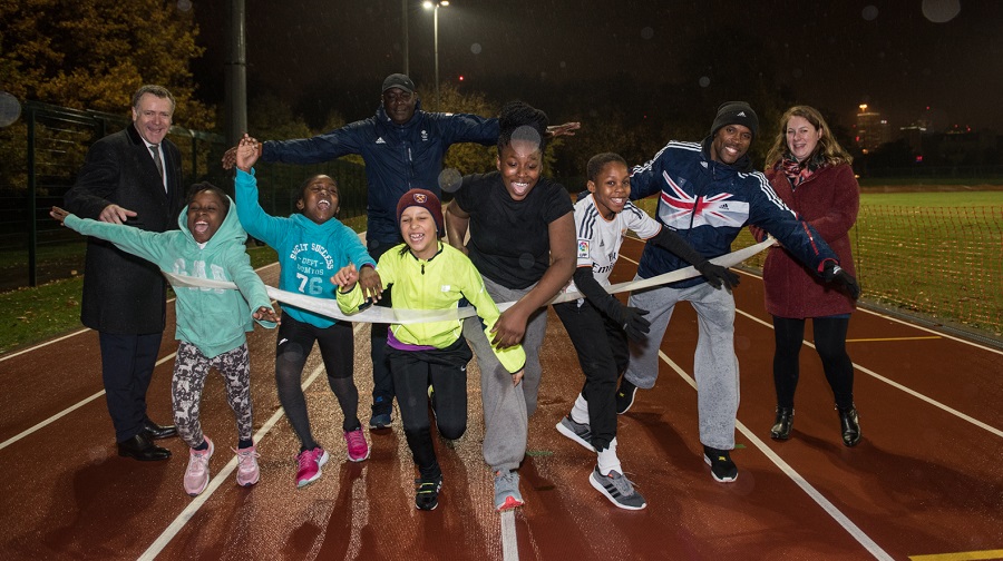 Southwark-Park-athletics-track.-From-the-back-left-cllr-Peter-JohnConrad-Williams-Lloyd-Cowan-cllr-Maisie-Anderson-joined-by-kids-from-London-City-Athletics-Club